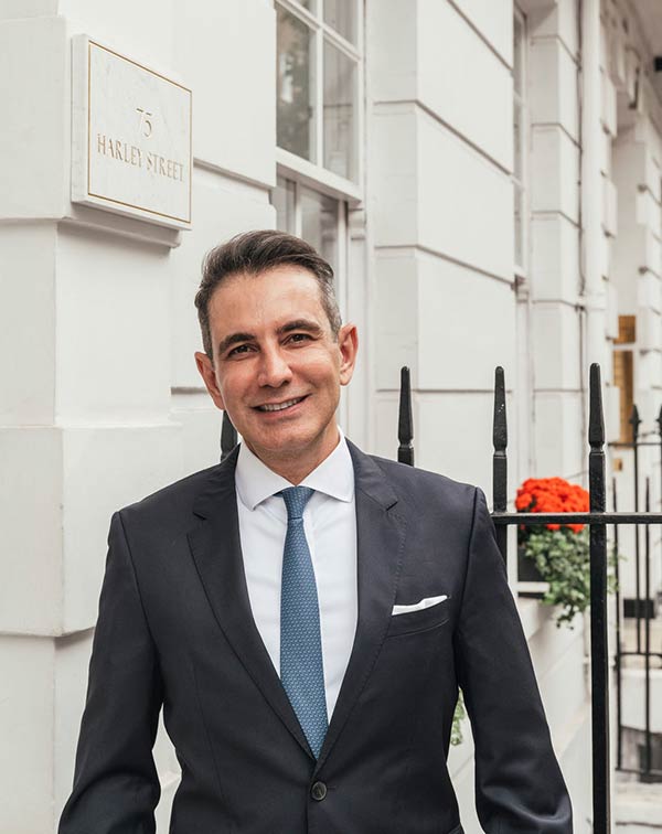 Dr Haus standing outside 75 Harley Street